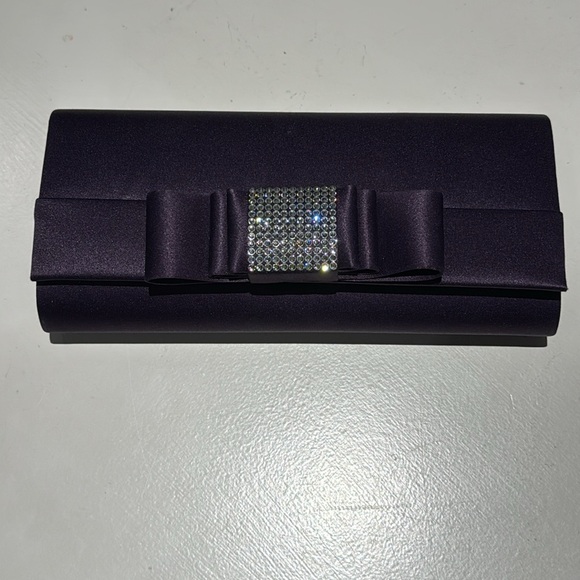 Dark purple satin evening clutch with crystal bow detail - Picture 1 of 4